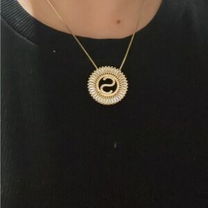 Elegant Gold and Black Pendant Necklace